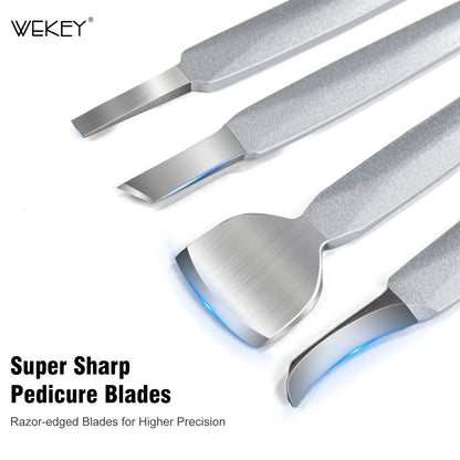 Close-up of stainless steel pedicure blades with textured handles on white background