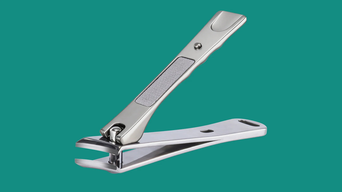 Classic 2-in-1 German nail cutter featuring an integrated nail file on the handle, combining clipping and smoothing in one stainless steel tool